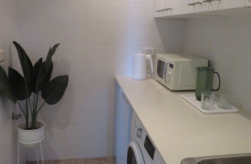 Seaforth Apartment | Stylish apartment with beautiful garden patio