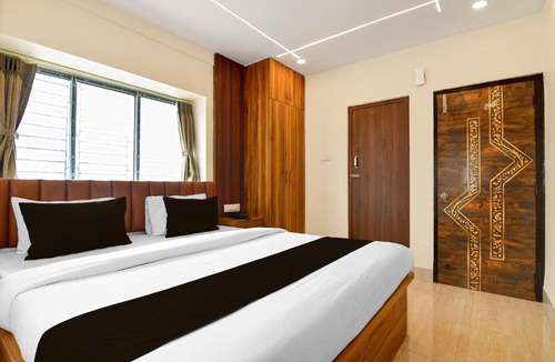 New Town Hotel | Super Collection O Newtown Bus Stand Formerly The Executive Suites