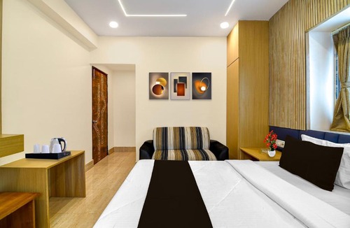 New Town Hotel | Super Collection O Newtown Bus Stand Formerly The Executive Suites