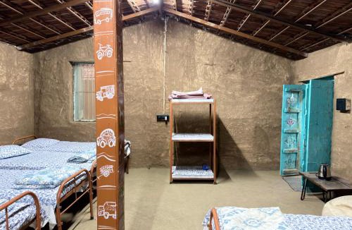 Nashik House | The Peepal mud homes farm stay