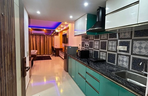 New Town Apartment | The Urban Sanctuary: Industrial-Chic Studio with Private Balcony & City Views