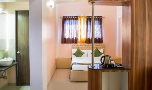 Pune Hotel | Treebo Naunidh Suites