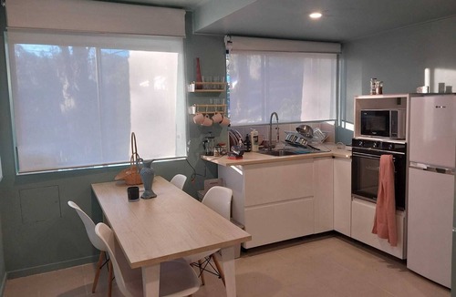 North Gosford Apartment | Urban Mini-Farm 2bm, 1 bath, kitchen, laundry, and dining.