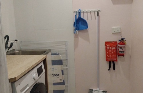 North Gosford Apartment | Urban Mini-Farm 2bm, 1 bath, kitchen, laundry, and dining.
