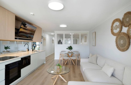The Entrance Apartment | Waterfront, Pool, Balcony, Prime Location