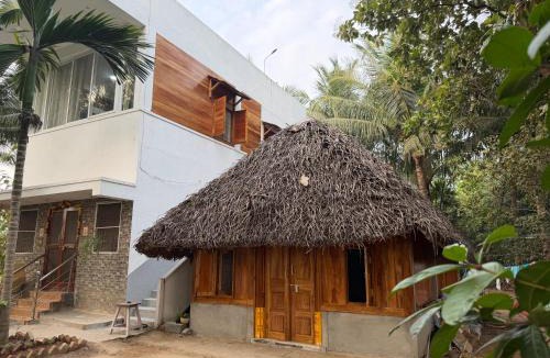 Tiruvettipuram House | Wooden Cottage