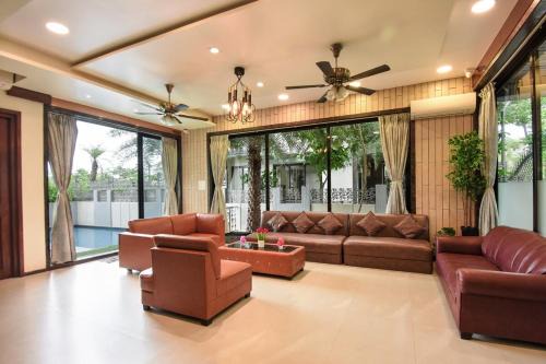 7BHK Pool House by VLove Homes