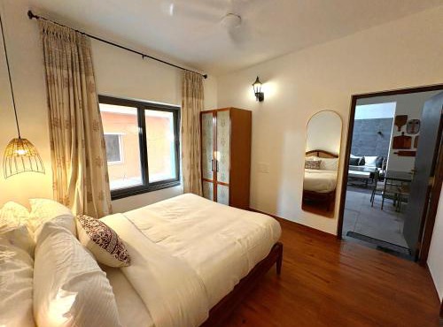 Candolim's Exclusive 1BHK - Curated Couple Stay with Private Jacuzzi Near Beach