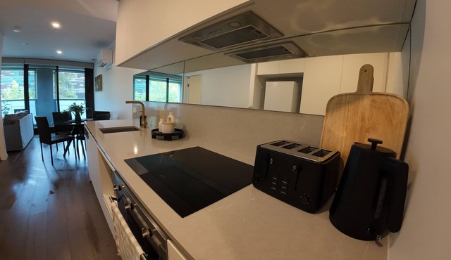 City Retreat with Rooftop Pool, Private Parking & City Views