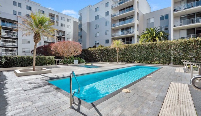 Modern 1-Bed Unit with Pool Views and Balcony