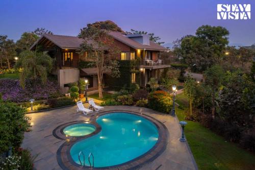 StayVista at Brickhouse Aranya with Pool and Farm View