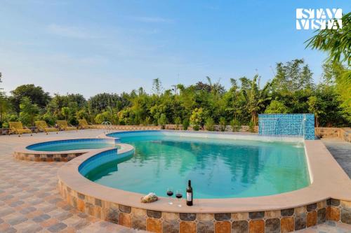 StayVista's Green Embrace - Villa in Bor Tiger Reserve with Swimming Pool, Rainshower, Terrace & Lawn