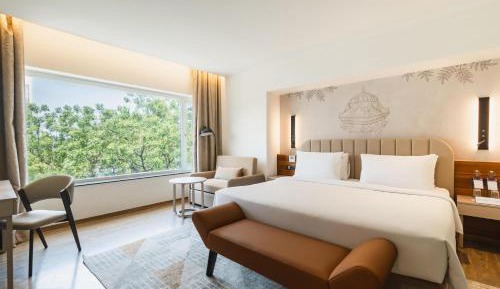 Deluxe Room with Complimentary Shuttle Pickup and Drop to Sai Baba Temple and Guaranteed early check in and late Check out upto 3 hours (Subject to availability)