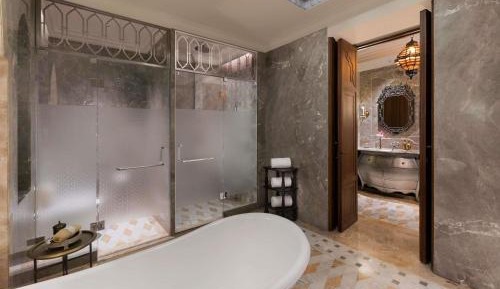 Raffles One King Bedroom Suite with Plunge Pool: Airport Transfers, 01 Bottle of wine, INR 3000 hotel credit once during the stay. Book for two nights and receive one 60-minute spa therapy for one person. 20% savings on hotel services