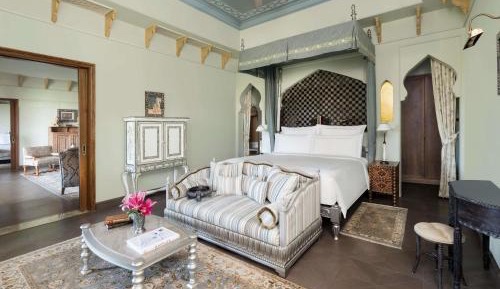 Rajmata Two-Bedroom Presidential Suite with Pool: Airport Transfers in luxury vehicle, 01 Bottle of champagne, INR 5000 hotel credit once during the stay. One 60-minute spa therapy for couple, Evening Hi-Tea at Safir/ Sundowner session with Bartender for 