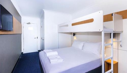 Standard Triple Room with Queen Bed and Bunk Bed Above
