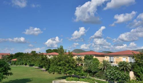 Grand Villa with Balcony and Resort View - Watch 1 Complimentary movie at the in house theater, Early Check-in by 12:00Hrs and Late Check-out by 13:00Hrs (Subject to Availability)