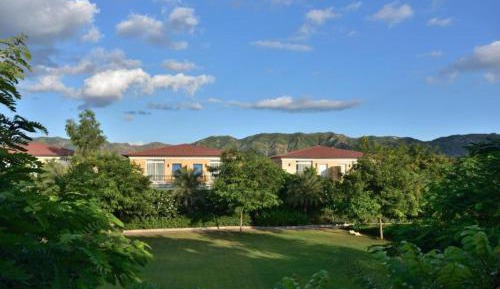 Twin Bedded Grand Villa with Balcony and Resort View - Watch 1 Complimentary movie at the in house theater, Early Check-in by 12:00Hrs and Late Check-out by 13:00Hrs (Subject to Availability)