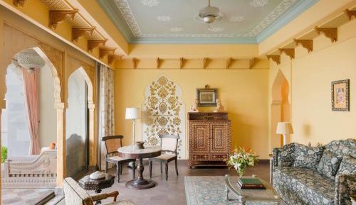 Maharani One King Bedroom Royal Suite with Pool: Airport Transfers in luxury vehicle, 01 Bottle of wine, INR 5000 hotel credit once during the stay. One 60-minute couple spa therapy. Evening Hi-Tea / Sundowner with Bartender, Butler Service