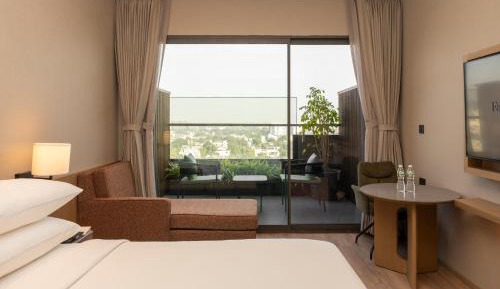 Studio King Room with City View and Balcony  (Early Check in &Late Check out-subject to availability,10% off on Laundry, Complimentary High Tea) )