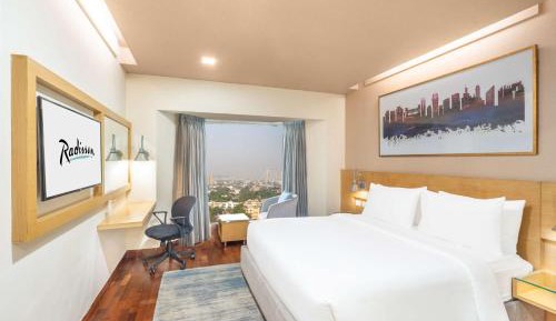 Deluxe Double or Twin Room with 20% Discount on food and soft beverages, Laundry and liquor and spa, INR 500 credit, one mug of freshly brewed beer during the stay ((330 ml)
