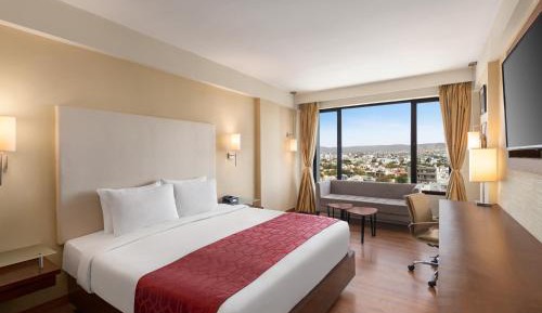 King Deluxe Room:Enjoy Happy Hours with 1+1 offer on Alcoholic Beverages | 10% off on Food & Beverage services | Guaranteed Early check-in & Late check-out by 3hrs  