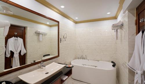 Heritage Premium Room - - 10% Discount on Foods & Soft Beverages* | 15% Discounts on Laundry Services* | INR 500 spa credit during your stay on selective Massage services. TnC Apply.* | Free Mini-bar - 2 cans of soft Beverages (Once on Arrival)