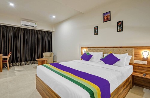 Palm Meadows Hotel | Happy Stays