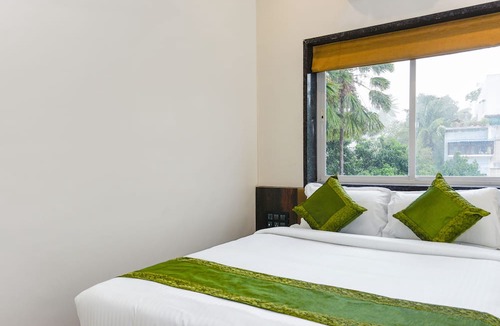 Nigdi Hotel | Treebo Malhaar Regency