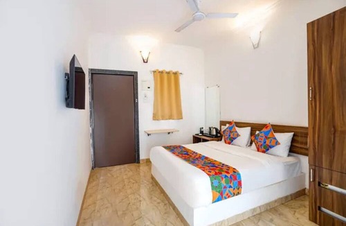 Morjim Hotel | FabHotel Palm Inn Resort
