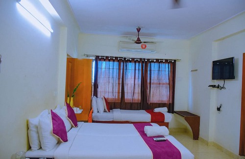 Koyambedu Hotel | Naksha Tree Hotels Kishore Inn - Koyambedu