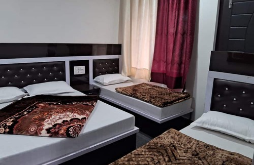 Kharsali Hotel | Goroomgo Uniyal Residency Uttarkashi