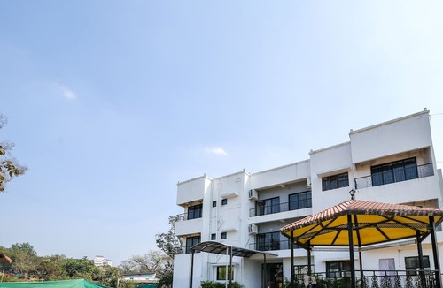 Khanvel Hotel | OYO Flagship Hotel Green-acre