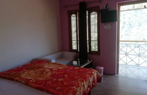 Kharsali Hotel | Goroomgo Utsav Palace Uttarkashi