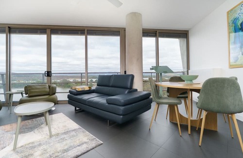 City West Apartment | Stylish Top-Floor Apt with Lake and Mountain Views
