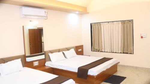 Ghodegaon Hotel | Vrindavan Guest house Near by Bhimashankar Road Pune