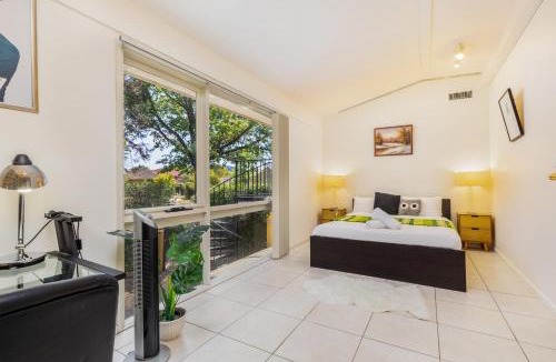 Yarralumla House | Sunlit Upstairs Suite with Hot Tub & Garden surrounds