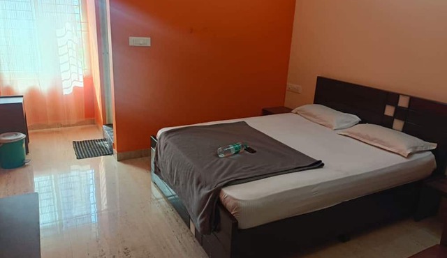 NEW SURYA DELUXE BOARDING AND LODGING