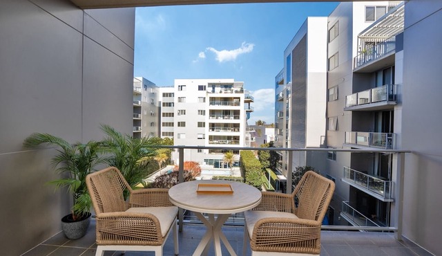 Modern 1-Bed Unit with Pool Views and Balcony