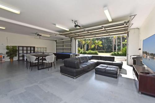 Lake Palm Resort Luxury Retreat absolute Waterfront on 3 acres at Lake Macquarie.
